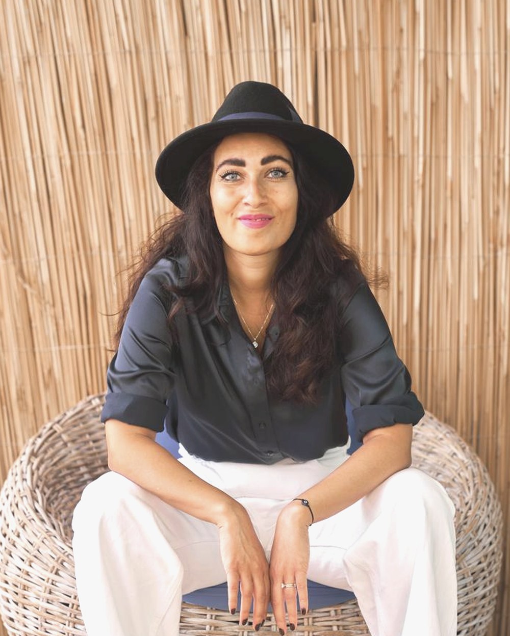 Shazia, smiling in warm afternoon light